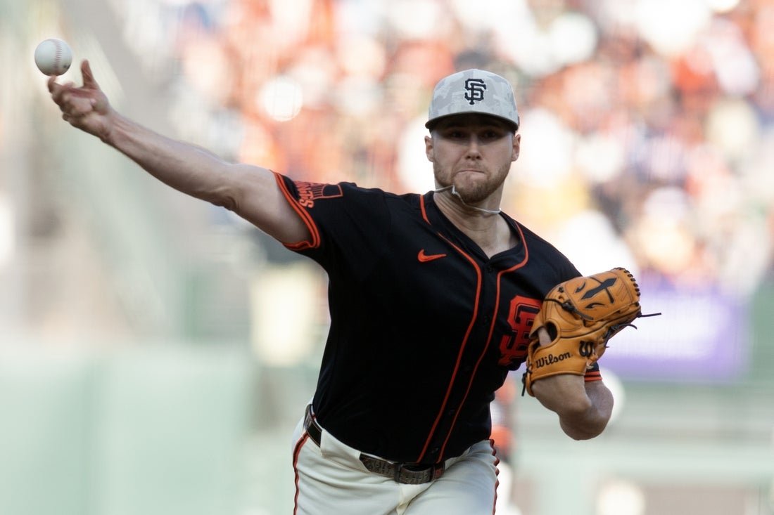 Los Gigantes superan a los Atléticos con base por bolas llena de Wilmer Flores en la décima entrada